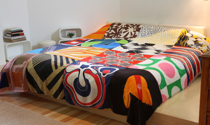 Ouno Design creates cool bedspreads out of vintage scarves. Gather vintage scarves and sew your own, if you have basic skills and a machine.
Ouno Design creates cool bedspreads out of vintage scarves. Gather vintage scarves and sew your own, if you have basic skills and a machine.