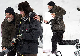 Photos of George Clooney Filming The American and Getting Into a Snowball Fight on Set in Sweden