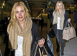 Photos of Kate Winslet Arriving at Heathrow Airport Wearing Jeans and a Large Cozy Scarf