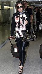 Photos of Cheryl Cole at Heathrow Airport in a Printed Hoody Dress