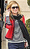 Photo of Kate Moss Wearing Piped Red Jacket and Striped Shirt in Paris