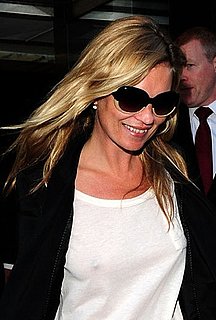 Kate Moss in London in Cropped Leather Pants, White Tee, and Two-Tone Sunglasses