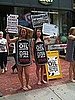Lush Employees Wear Oil Barrels to Protest Tar Sands