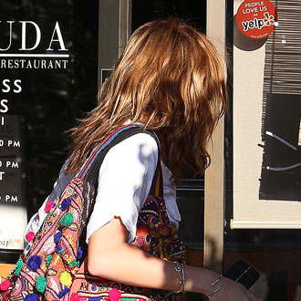 Guess Who Is Carrying a Wildly Colorful Purse? Guess Who Is Carrying a Wildly Colorful Purse?