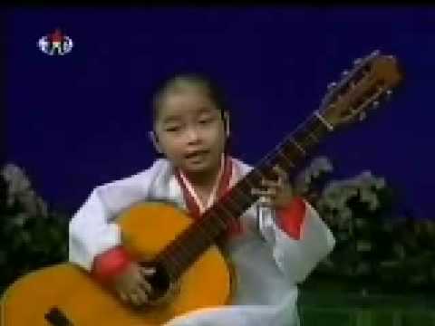 Amazing young girl playing the guitar!