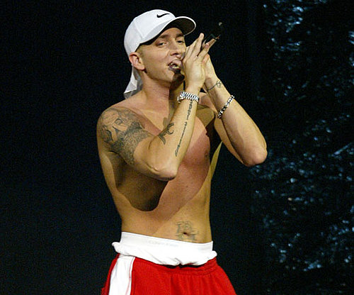 Eminem stripped down to show off his shirtless body in 2002.
Eminem stripped down to show off his shirtless body in 2002.