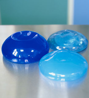 World's Largest Breast Implants Get Removed