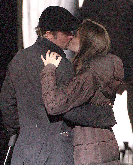 Angelina Jolie and Brad Pitt kiss On set