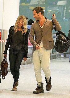 Pictures of Sienna Miller and Jude Law Arriving Back in London Together