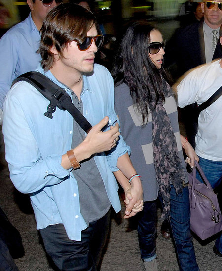 Pictures of ashton kutcher and demi moore arriving in brazil
