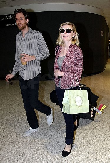 Kirsten Dunst Returns From Her Couture Adventures to Her Boyfriend Kirsten Dunst Returns From Her Couture Adventures to Her Boyfriend