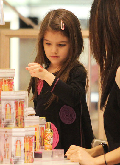 Pictures of Suri Cruise Trying on Lipstick in Vancouver Pictures of Suri Cruise Trying on Lipstick in Vancouver