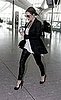 First Pictures of Victoria Beckham Pregnant at Heathrow