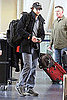 Pictures of Bradley Cooper Departing Out of LAX