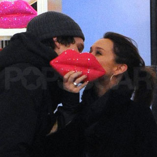 Guess Who's Puckering Up to Kiss Her Man?