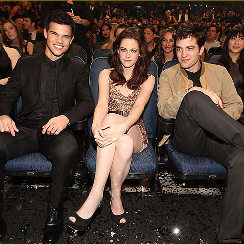 Kristen Stewart had a sweet spot between her leading men, Robert Pattinson and Taylor Lautner, at the January 2011 People's Choice Awards in LA.
Kristen Stewart had a sweet spot between her leading men, Robert Pattinson and Taylor Lautner, at the January 2011 People's Choice Awards in LA.