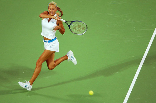 Anna Kournikova displayed her favorite designer brand and colors in an all Adidas tennis attire.
Anna Kournikova displayed her favorite designer brand and colors in an all Adidas tennis attire.