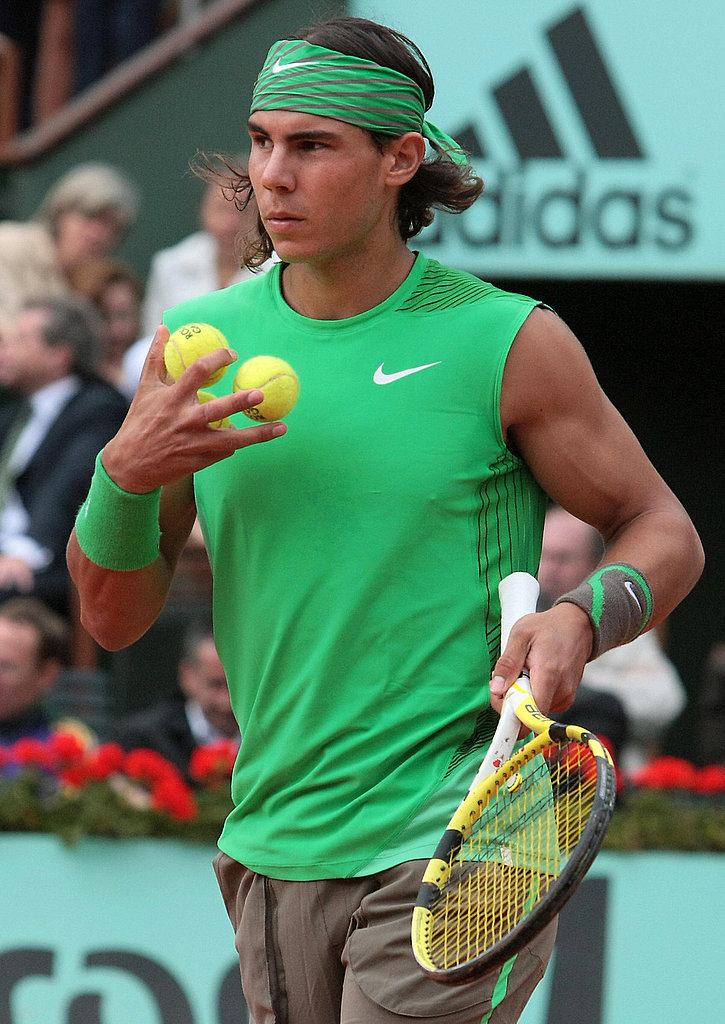Rafael Nadal sported his signature head and wrist band in his favorite color green at the French Open in 2008.
Rafael Nadal sported his signature head and wrist band in his favorite color green at the French Open in 2008.