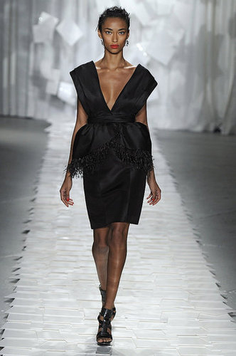 Jason Wu's LBD may seem demure, but a deeper neckline gives way to sultrier interpretations.
Jason Wu's LBD may seem demure, but a deeper neckline gives way to sultrier interpretations.