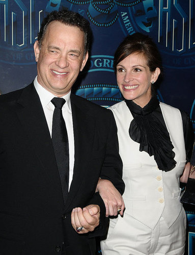 Julia Roberts and her Larry Crowne costar Tom Hanks smiled for the cameras at an awards ceremony in February.
Julia Roberts and her Larry Crowne costar Tom Hanks smiled for the cameras at an awards ceremony in February.