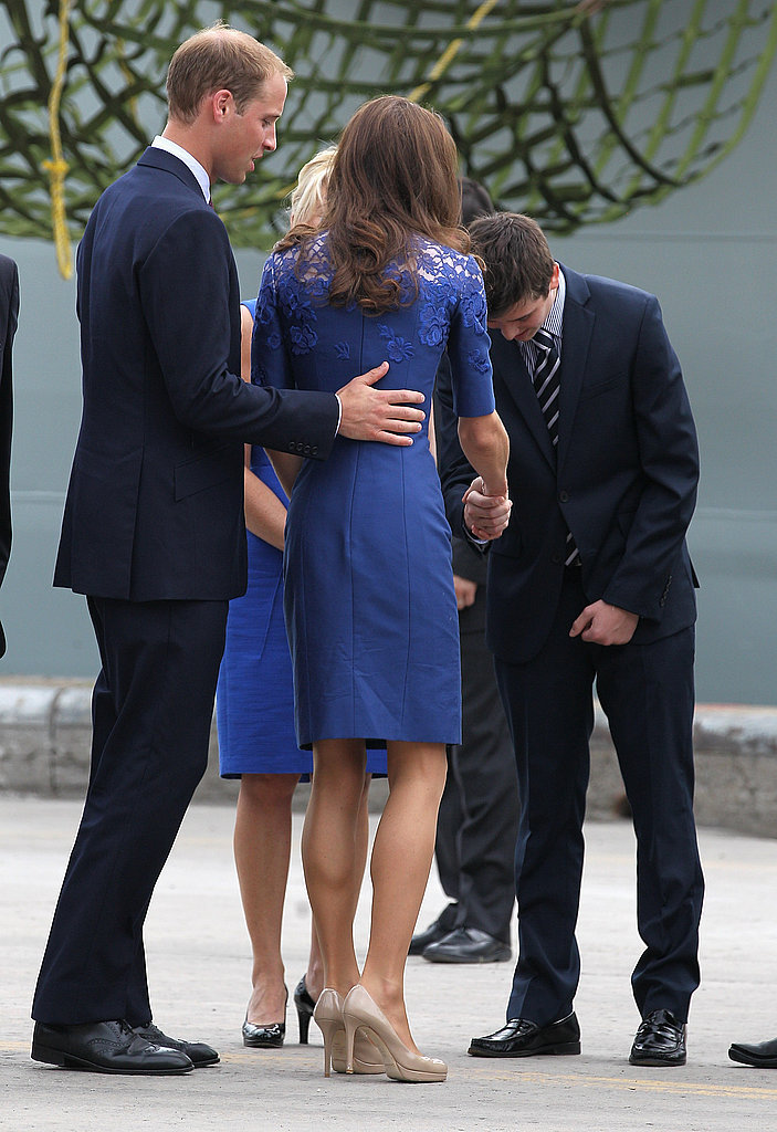 Prince William touched Kate's back as they arrived in Quebec City in 2011.
Prince William touched Kate's back as they arrived in Quebec City in 2011.