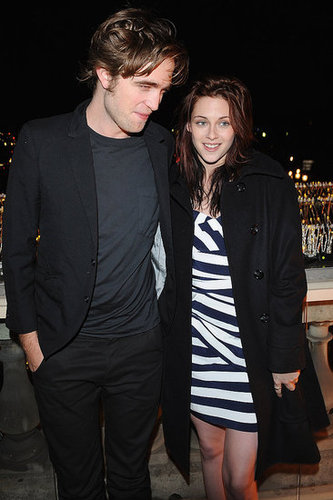 Robert Pattinson and Kristen Stewart enjoyed the view at a Paris photocall in December 2008.
Robert Pattinson and Kristen Stewart enjoyed the view at a Paris photocall in December 2008.