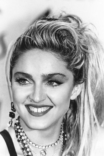 Isn't this how most of us remember Madonna? The Material Girl sat for an AMAs press conference in 1985.
Isn't this how most of us remember Madonna? The Material Girl sat for an AMAs press conference in 1985.