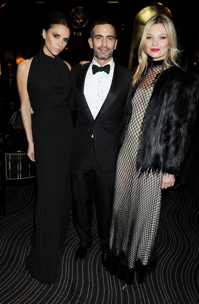 Victoria Beckham and Kate Moss snapped a pic with designer Marc Jacobs. Victoria Beckham and Kate Moss snapped a pic with designer Marc Jacobs.