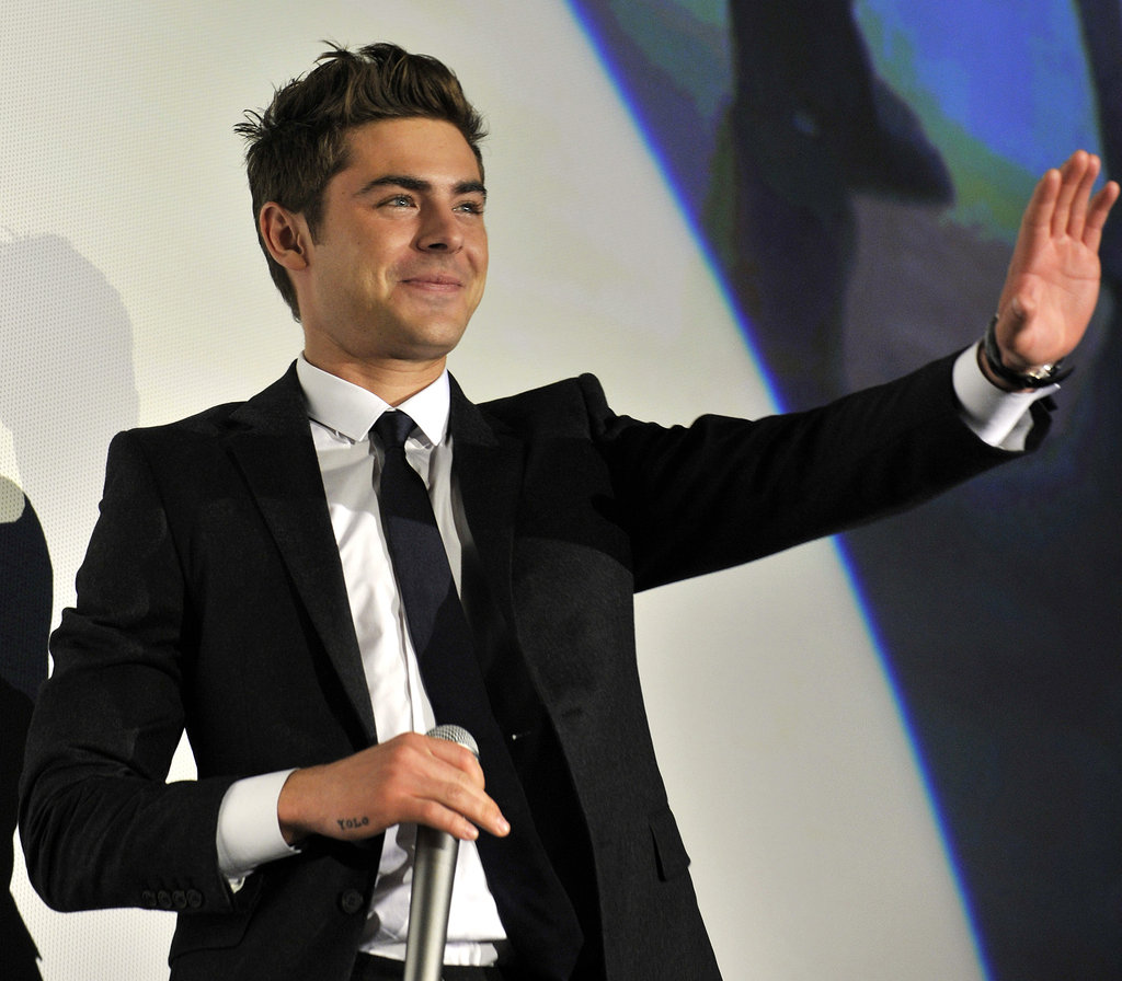 Zac Efron Gets YOLO Tattoo on Right Hand Pictures Zac Efron Gets YOLO Tattoo on Right Hand Pictures