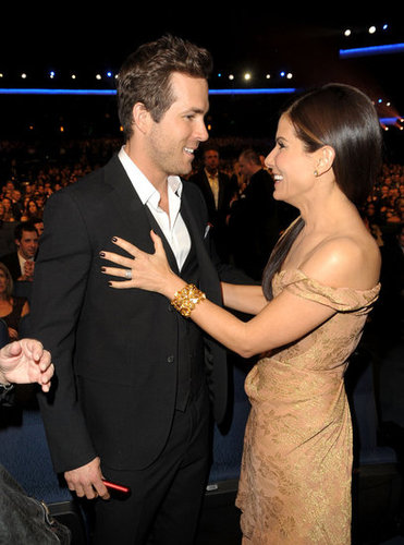 Longtime friends Ryan Reynolds and Sandra Bullock shared a laugh together in 2010.
Longtime friends Ryan Reynolds and Sandra Bullock shared a laugh together in 2010.