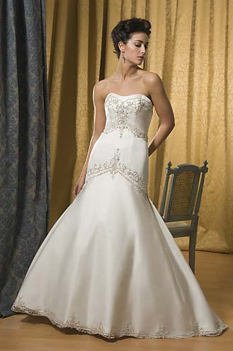 You have a great looking wedding dress that is simple but far from plain