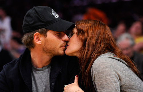 Drew Barrymore and Will Kopelman shared a sweet kiss during a break from game play during an April 2011 LA Lakers game.
Drew Barrymore and Will Kopelman shared a sweet kiss during a break from game play during an April 2011 LA Lakers game.