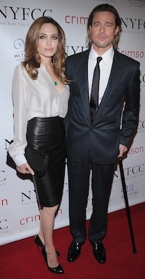 Angelina Jolie in Ferragamo Leather Skirt, Silk Blouse