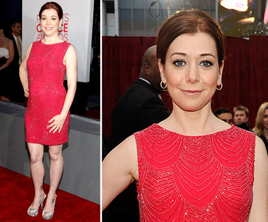Alyson Hannigan is quite the lady in red showing off her baby bump in a