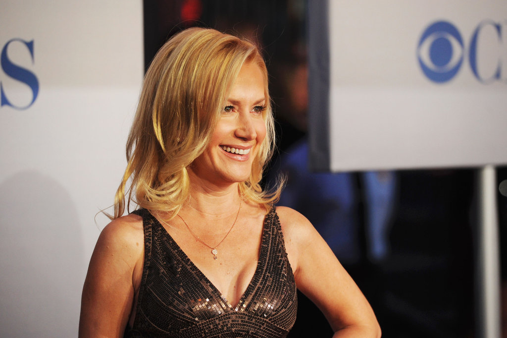 Angela Kinsey smiled in a metallic dress.
Angela Kinsey smiled in a metallic dress.