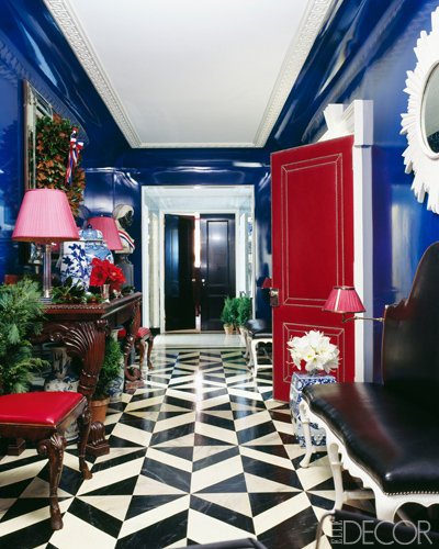 Dark glossy walls and a graphic floor call for equally bold accents of cherry red.
Source
Dark glossy walls and a graphic floor call for equally bold accents of cherry red.
Source