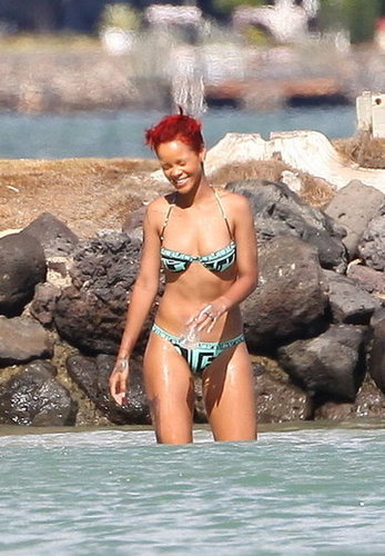 Rihanna broke from the set of Battleship in September 2010 to swim in her bikini at the beach in Honolulu.
Rihanna broke from the set of Battleship in September 2010 to swim in her bikini at the beach in Honolulu.