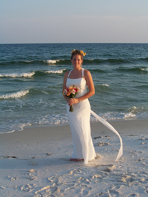 Beach wedding dresses run the gamut from absolutely simple to fabulously 