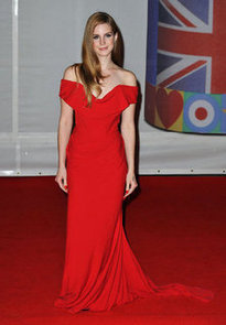 Pictures of Lana Del Rey in Red Vivienne Westwood Gown at the 2012 Brit Awards