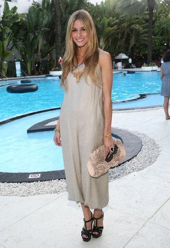 Poolside-chic in a summery frock and eclectic add-ons in Miami in June 2009.
Poolside-chic in a summery frock and eclectic add-ons in Miami in June 2009.