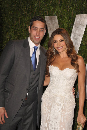 Sofia Vergara in a strapless white lace gown by Roberto Cavalli with boyfriend Nick Loeb.
Sofia Vergara in a strapless white lace gown by Roberto Cavalli with boyfriend Nick Loeb.