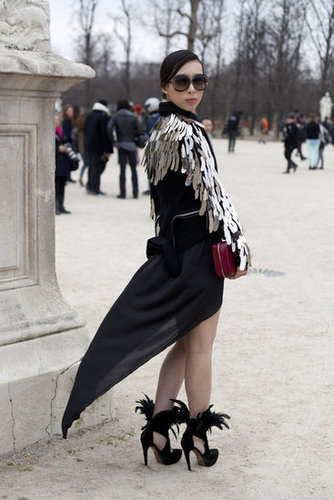 Fashion-forward details from her coat to her heels.
Fashion-forward details from her coat to her heels.