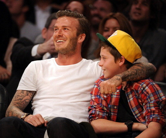 David and Brooklyn Beckham at the Lakers game. David and Brooklyn Beckham at the Lakers game.