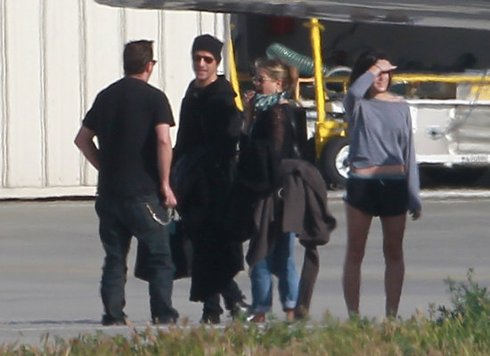 Jennifer Aniston and Justin Theroux got off a private plane. Jennifer Aniston and Justin Theroux got off a private plane.