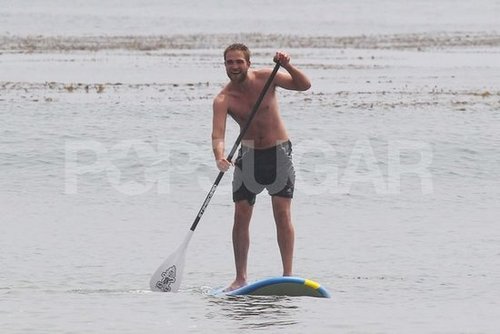 Robert Pattinson went paddleboarding shirtless.
Robert Pattinson went paddleboarding shirtless.