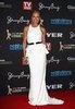 Pictures of Sonia Kruger in Manning Cartell White Gown on the Red Carpet at the 2012 Logies