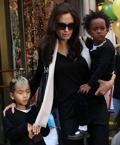 Maddox and Zahara stuck close to Angelina Jolie while out in NYC in October 2008.
Maddox and Zahara stuck close to Angelina Jolie while out in NYC in October 2008.