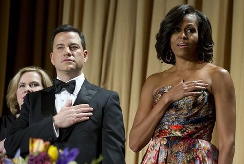 Michelle Obama and Jimmy Kimmel rose for the pledge of allegiance.
Michelle Obama and Jimmy Kimmel rose for the pledge of allegiance.