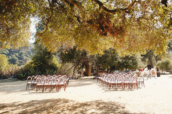 To keep up the natural, earthy style, try an archway made of branches. Dress it up with flowers and greenery — or don't, since it's gorgeous all on its own.
Source
To keep up the natural, earthy style, try an archway made of branches. Dress it up with flowers and greenery — or don't, since it's gorgeous all on its own.
Source
