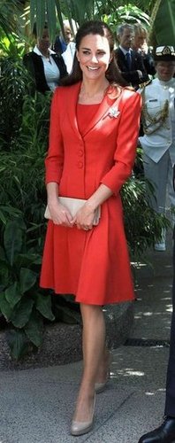 Here's a full-length view of her red-on-red ensemble. She chose a Catherine Walker dress to go with her red blazer and nude LK Bennett pumps.
Here's a full-length view of her red-on-red ensemble. She chose a Catherine Walker dress to go with her red blazer and nude LK Bennett pumps.